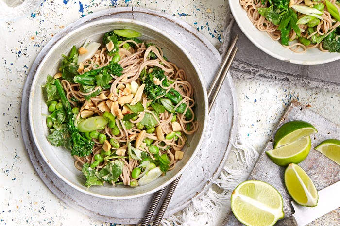 Soba Noodles with Broccoli and Peanuts in a Bowl