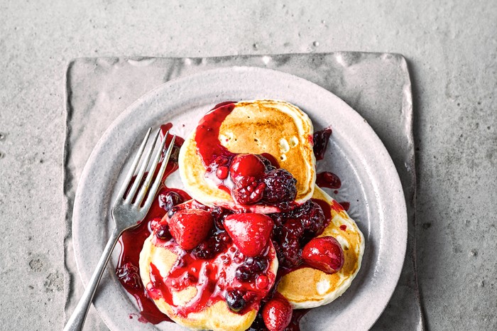 Stack of Vegan Pancakes Topped with Berry Compote